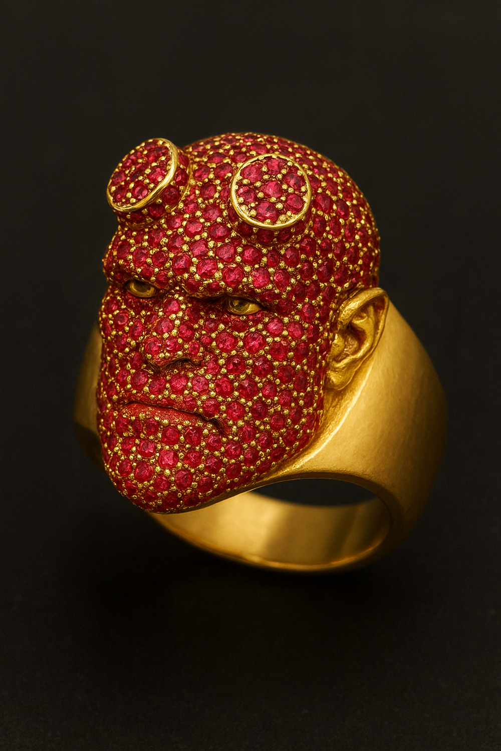 I want a hellboy faced 18k gold ring with PAVE set of rubys as on the picture. - original photo